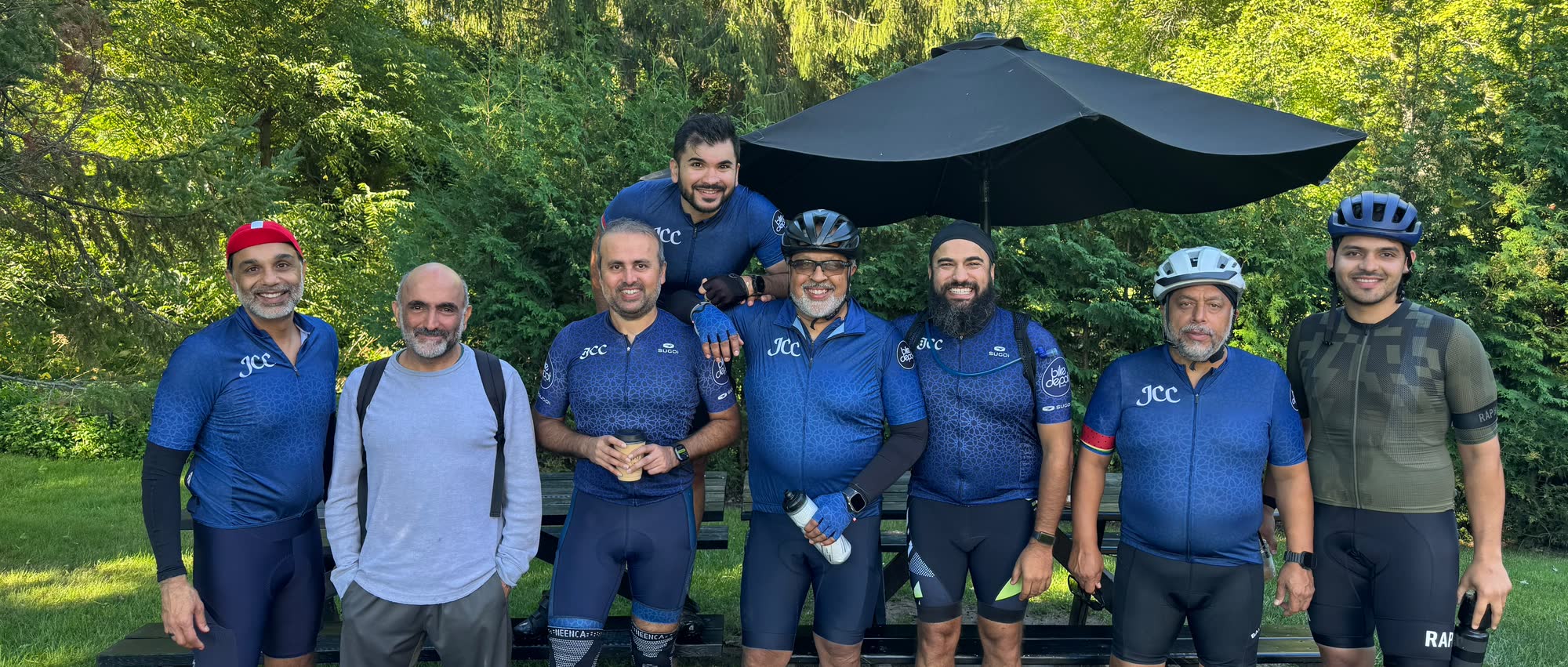 Jaffari Cycling Club gathered with their bikes at sunrise