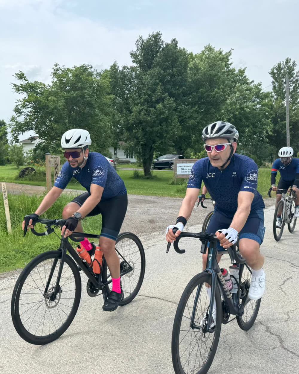 Club members riding two abreast on a Sunday group ride